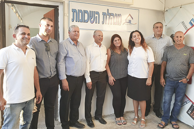 מנהלת השכונות מציינת חצי שנה ובית חדש